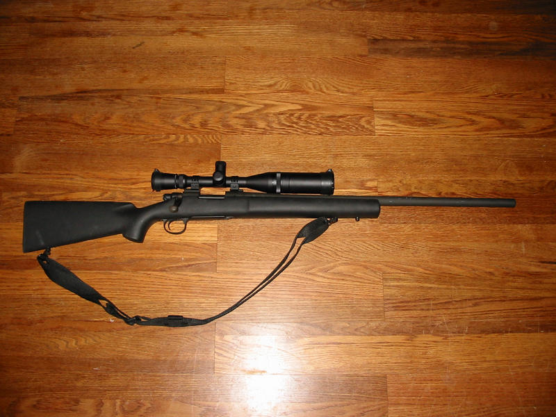 "<Buddy> its a very nice picture of a very pretty gun :-)"