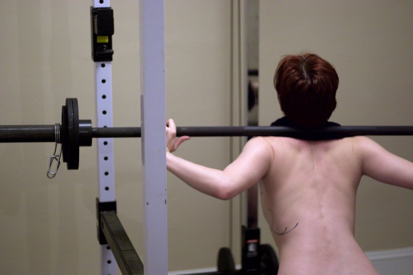 Zeph doing deep squats.