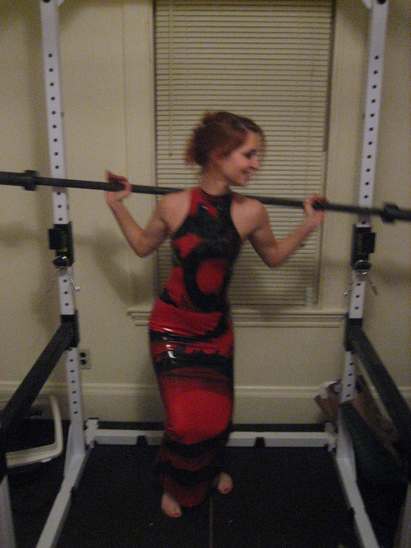 Calico demonstrating a deep squat in latex