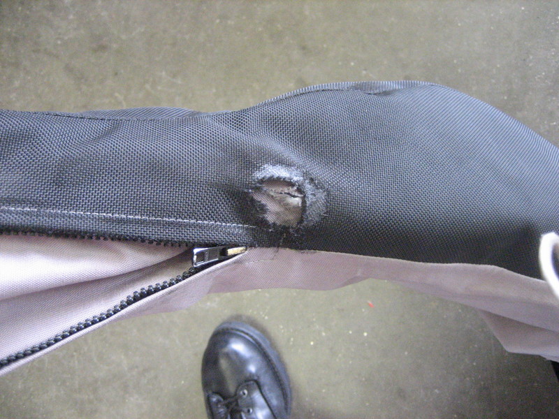 Aerostich Roadcrafter race track crash damage.