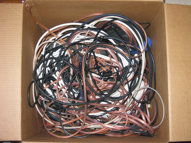 Computer and stereo wires boxed for moving.
